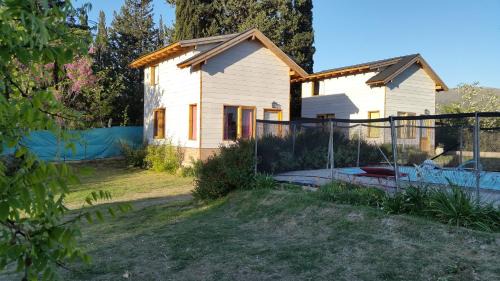 Huerta Grande Cabina | Altos del Pucara Piscina Climatizada vista a las sierras juegos infantiles