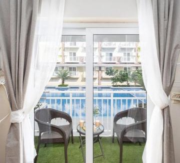 Mactan Export Processing Zone Apartamento | AMANI 132B with Pool View, Near Airport, Mall, Free Pool, Gym, Netflix, 200 Mbps Wi-fi