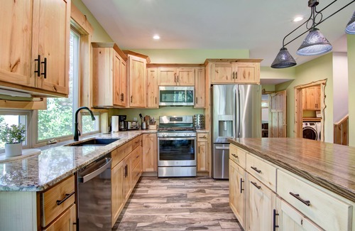 Tainter Lake Casa | Amazing River House with covered patio! Sleeps 10-14. Kayaks,Fireplace,Games.
