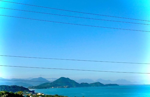 Toninhas Apartamento | Amplo apê condomínio piscina Toninhas Ubatuba