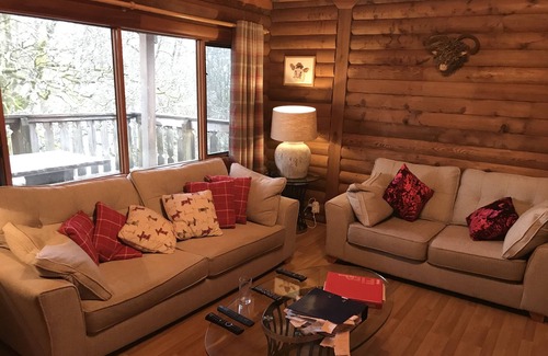 Portsonachan Casa | An Amazing Cedar 3 Bedroom Lodge On The Lochside at Portsonachan