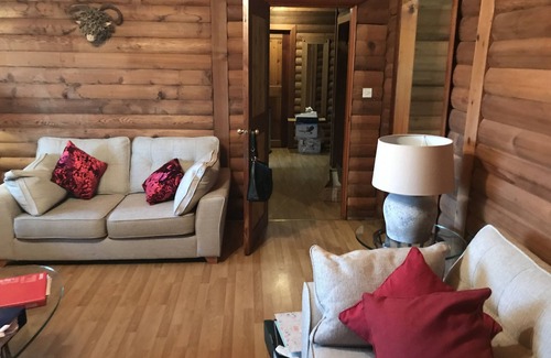 Portsonachan Casa | An Amazing Cedar 3 Bedroom Lodge On The Lochside at Portsonachan
