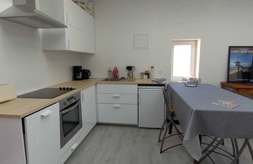 Lion-sur-Mer Apartamento | An apartment with your feet in the sand