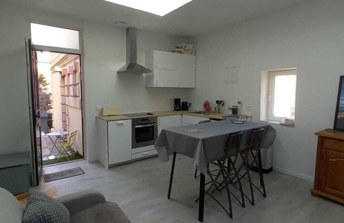Lion-sur-Mer Apartamento | An apartment with your feet in the sand