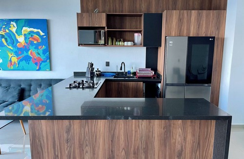 Puerto Morelos Hotel | Angelina 28 Beachfront and Family Apartments - Modern and Relaxing Long Stays (20 min from Cancun Airport)