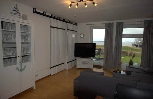Lembruch Apartamento | Anteros Dümmerblick Ferienwohnung mit Traumhaften Seeblick