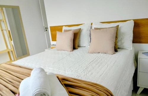 Aruanda Apartamento | Apê Prime Confort 2 quartos com ar, vista piscina - a 6min da praia de Aruana