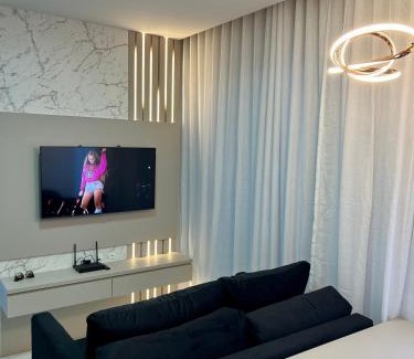 Centro Apartamento | Ap com Piscina no Rooftop, academia, Wi-Fi, cozinha completa, ar condicionado e garagem privativa a 900m da Vila Germânica