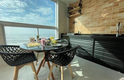 Vila Anhanguera Apartamento | Ap frente mar com ar-condicionado e varanda gourmet