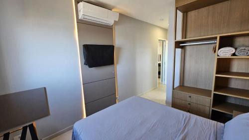 Vila Anhanguera Apartamento | Ap frente mar com ar-condicionado e varanda gourmet