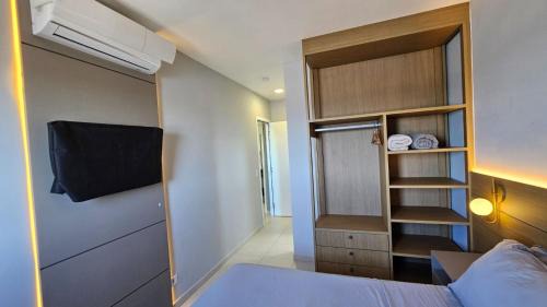 Vila Anhanguera Apartamento | Ap frente mar com ar-condicionado e varanda gourmet
