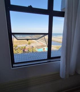 Caioba Apartamento | Ap Matinhos - Pé na areia e Vista para o Mar - Praia Brava - Caiobá