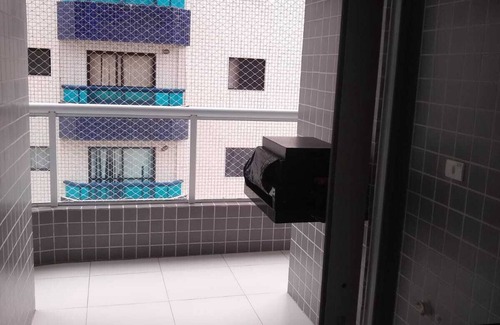 Praia Grande Apartamento | Apartment facing the sea in Vila Caiçara