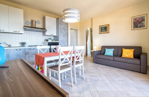 Trinita d'Agultu Apartamento | Apartamento 'Costiero' con vistas al mar, terraza privada y aire acondicionado