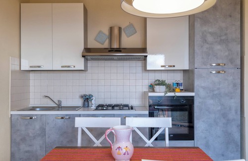 Trinita d'Agultu Apartamento | Apartamento 'Costiero' con vistas al mar, terraza privada y aire acondicionado