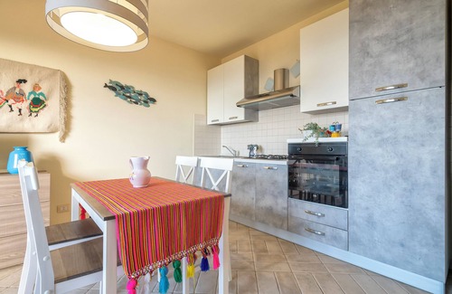 Trinita d'Agultu Apartamento | Apartamento 'Costiero' con vistas al mar, terraza privada y aire acondicionado