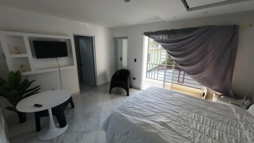 Los Charamicos Hotel | Aparta Hotel Ana Julia