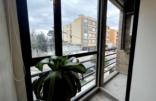 Campin Apartamento | Aparta suite Movistar arena - moderno, central y seguro. Terraza y bbq