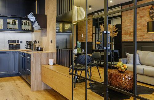 Nowy Targ Apartamento | APARTAMENT CHICAGO - stylowy apartament z KLIMATYZACJĄ o bardzo wysokim standardzie w centrum miasta, z prywatnym zadaszonym parkingiem - IZBY PODHALAŃSKIE
