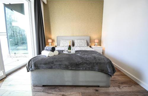 Ostroda Apartamento | Apartament VILLA PARK przy plaży z widokiem na jezioro, taras 50 m2