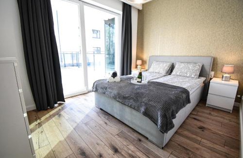 Ostroda Apartamento | Apartament VILLA PARK przy plaży z widokiem na jezioro, taras 50 m2