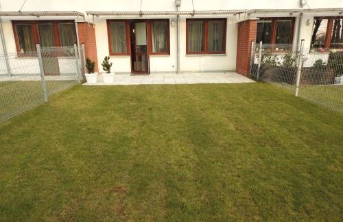 Kolobrzeg Apartamento | Apartament z ogrodem Wiśniowy Sad