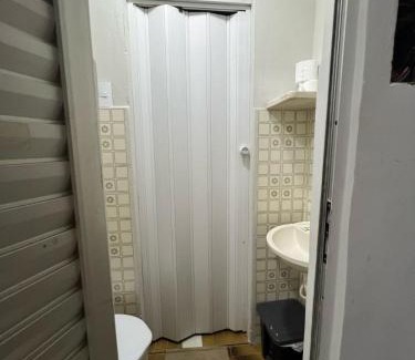 Patos de Minas Apartamento | Apartamento 101 - Suíte ampla para grupos e empresas