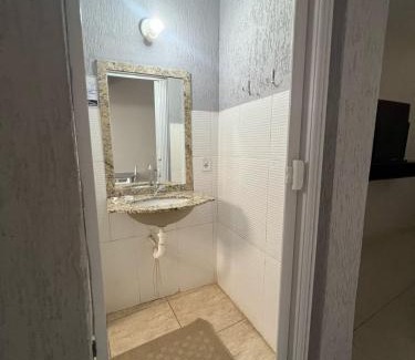 Patos de Minas Apartamento | Apartamento 102 - Suíte com ar condicionado
