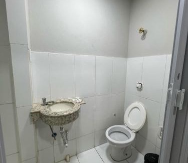 Patos de Minas Apartamento | Apartamento 110 - Suíte com ar condicionado