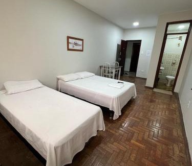 Patos de Minas Apartamento | Apartamento 111 - Suíte econômica com ar condicionado