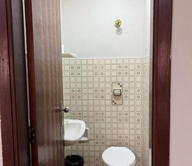 Patos de Minas Apartamento | Apartamento 111 - Suíte econômica com ar condicionado