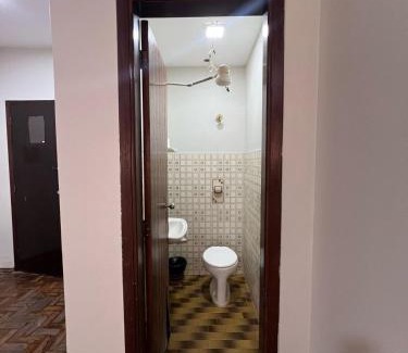 Patos de Minas Apartamento | Apartamento 111 - Suíte econômica com ar condicionado
