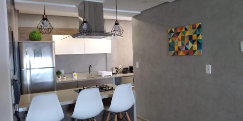 Ingleses Norte Apartamento | APARTAMENTO BEIRA MAR PÉ NA AREIA