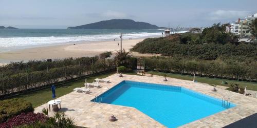 Ingleses Norte Apartamento | APARTAMENTO BEIRA MAR PÉ NA AREIA
