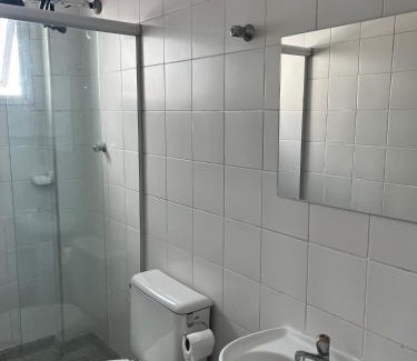 Boqueirao Apartamento | Apartamento com vista lateral da praia