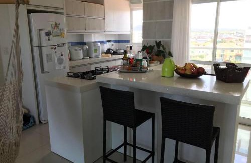 Barra Velha Apartamento | Apartamento com vista para o mar distante 150 m da praia