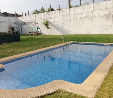Dean Pequeno Apartamento | Apartamento con terraza y piscina