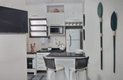 Toninhas Apartamento | Apartamento Condomínio Wembley Tênis - Toninhas - Ubatuba - SP