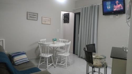 Toninhas Apartamento | Apartamento Condomínio Wembley Tênis - Toninhas - Ubatuba - SP