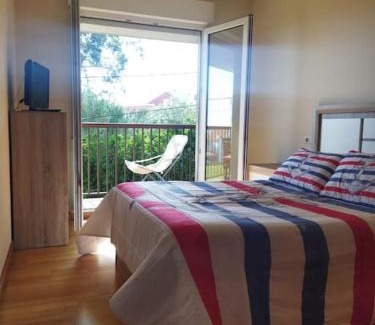 Aguino Apartamento | Apartamento delante de la playa.