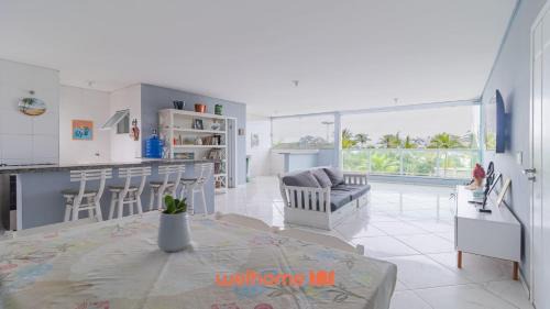 Morada da Praia Apartamento | Apartamento em Bertioga com vista para o mar