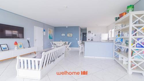 Morada da Praia Apartamento | Apartamento em Bertioga com vista para o mar