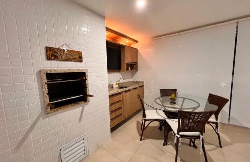 Vila Clais Apartamento | Apartamento em Bertioga com varanda gourmet