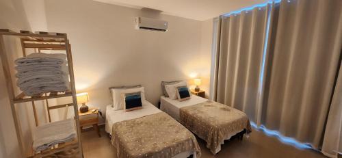 Itauna Apartamento | Apartamento em Itaúna vista para o mar e surf