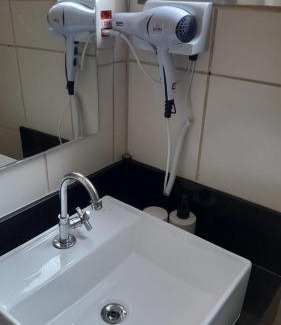 Embare Apartamento | Apartamento Frente Praia Embaré - Varanda Aconchegante - Pet Friendly