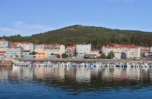 Portosin Apartamento | Apartamento Portosin con piscina al lado de la playa