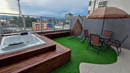 Capao da Canoa Apartamento | Apartamento Sofisticado Ed Del Paine terraço com hidro