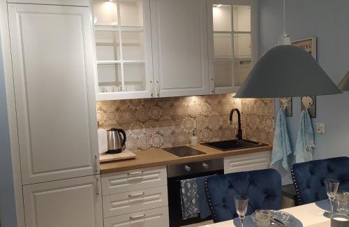 Bialystok Apartamento | Apartamenty Centrum Warszawska 66 niebieski i różowy