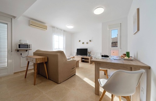 Sant Carles de la Rapita Apartamento | Apartamento 'La Basseta' con Wi-Fi y aire acondicionado
