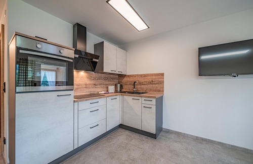 Hopfgarten Markt Apartamento | Apartment on a farm with private entrance